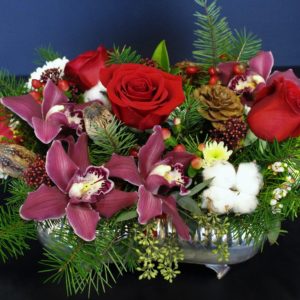 Rose red flowers with pine cones