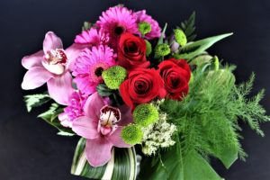 Close up for basket of red and pink flowers